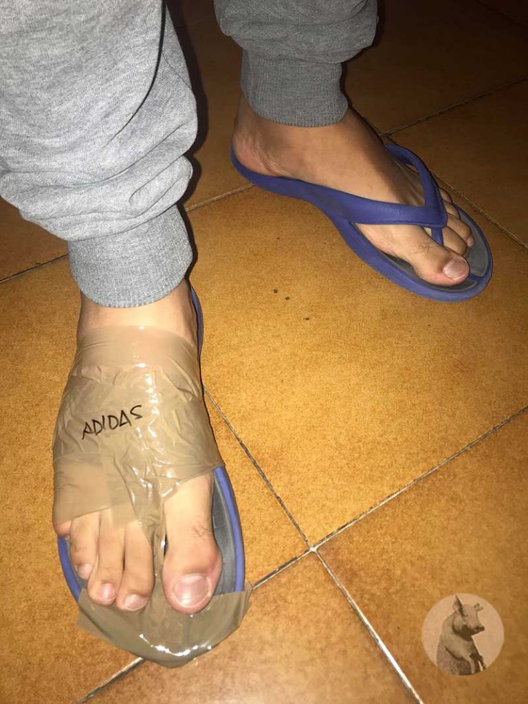 ciabatta adidas aggiustata